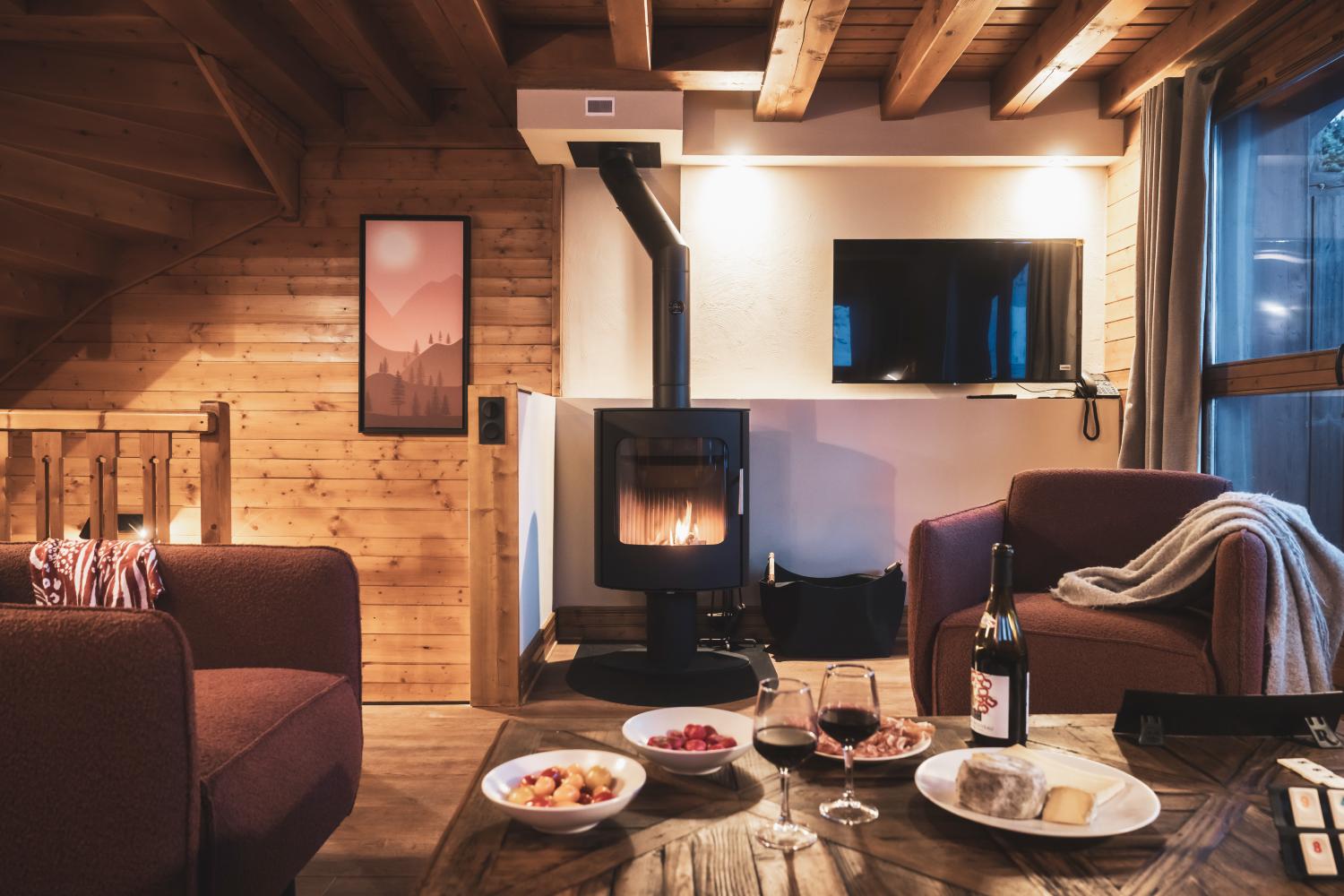 06-montagnettes-residence-sapiniere-menuires-5p8s-salon-01-cande-2026-1450738