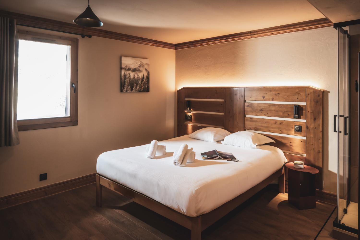 22-montagnettes-residence-sapiniere-menuires-4p6s-chambre-double-01-cande-2026-1450714