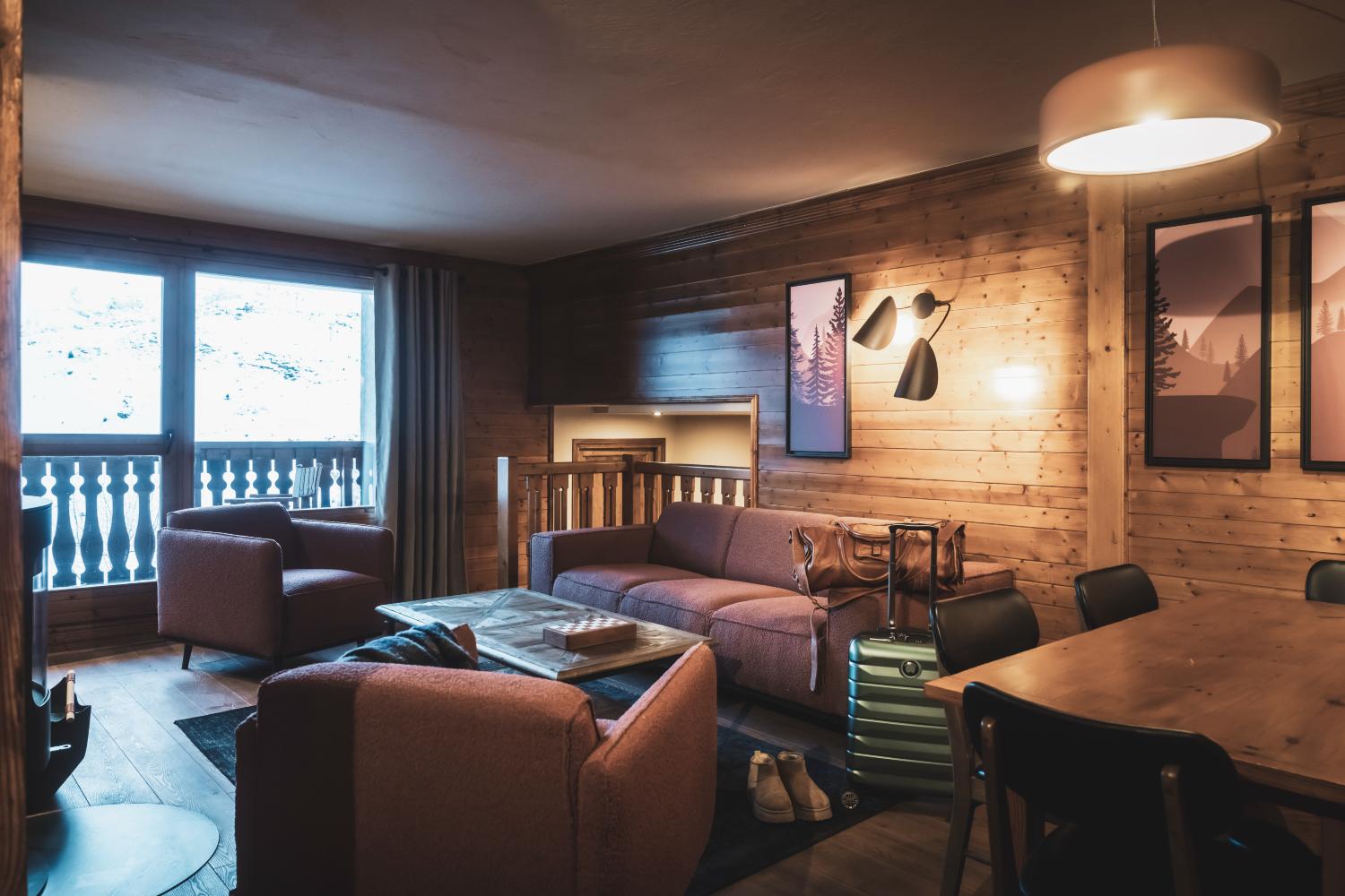 22-montagnettes-residence-sapiniere-menuires-4p6s-salon-01-cande-2026-1450711