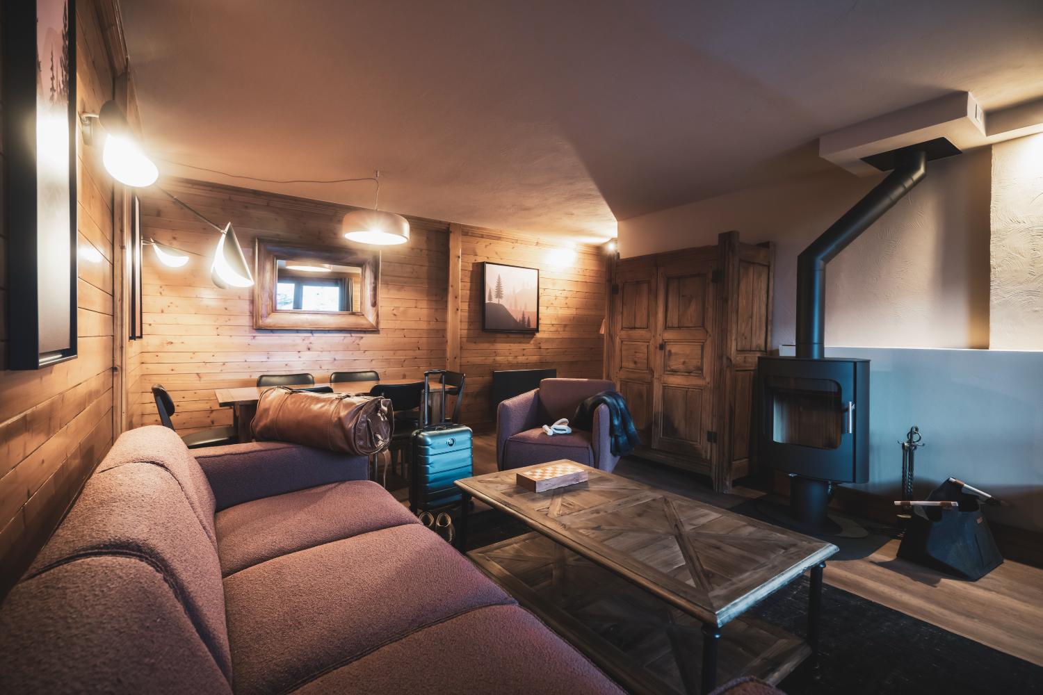 22-montagnettes-residence-sapiniere-menuires-4p6s-sejour-03-cande-2026-1450713