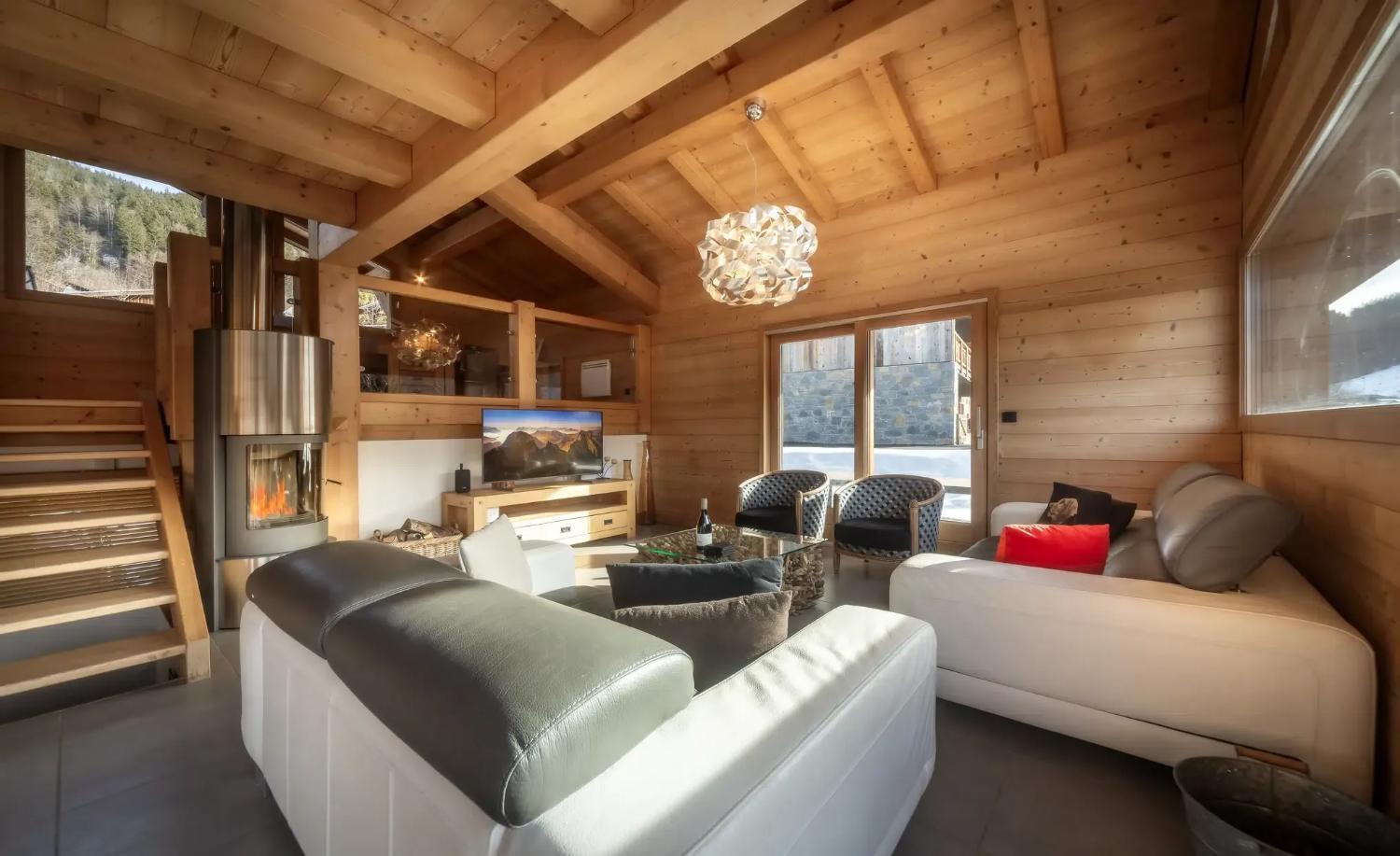 elevation-alps-chalet-sunnyside-open-plan-living-area-with-log-burner-1465929
