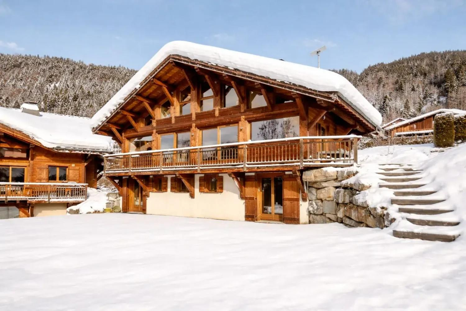 elevation-alps-chalet-sunnyside-exterior-snowy-1465924