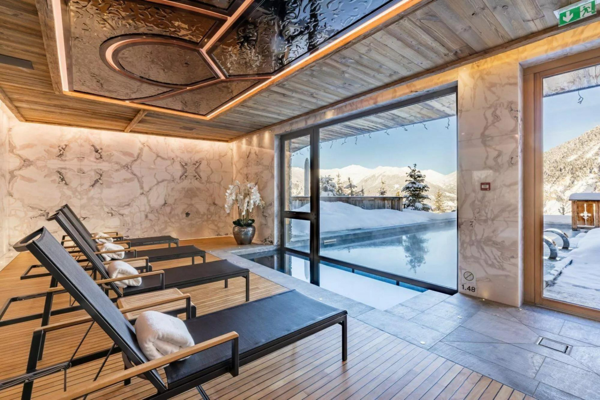 photos-bien-2123-indoor-outdoor-pool-with-spa-sud-resort-spa-fitness-at-ultima-courchevel-beleveadeare-1450317