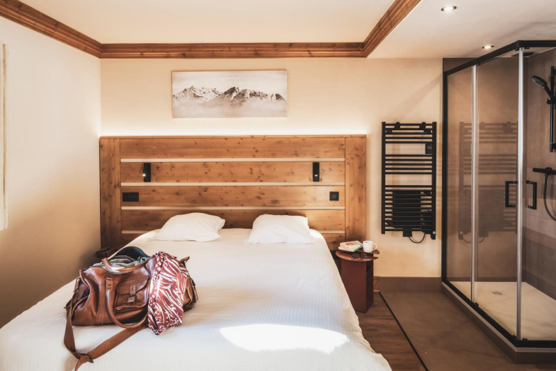 03-montagnettes-residence-sapiniere-menuires-5p8-chambre-double-01-cande-2026-1450731