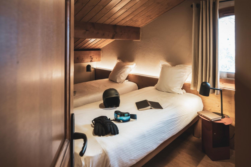 03-montagnettes-residence-sapiniere-menuires-5p8-chambre-twin-01-cande-2026-1450729