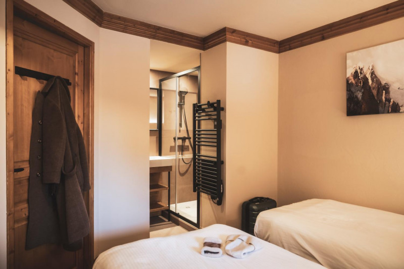 03-montagnettes-residence-sapiniere-menuires-5p8-chambre-twin-10-cande-2026-1450732