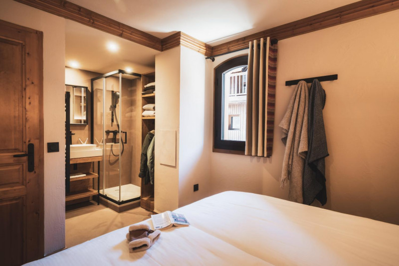 04-montagnettes-residence-sapiniere-menuires-3p6c-chambre-double-03-cande-2026-1450701