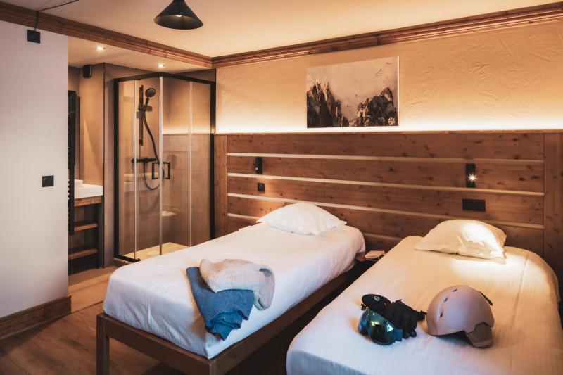 22-montagnettes-residence-sapiniere-menuires-4p6s-chambre-twin-03-cande-2026-1450718